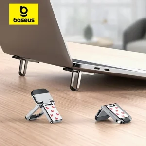 Laptop stand raising device on desk, ergonomic height.