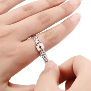 Measuring finger with ring size tape.