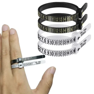 Adjustable ring sizers on hand for measurement